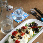 Ensalada de burrata italiana con tomates secos, piñones y rúcula. Receta ligera, fácil y rápida