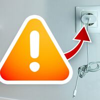 Por que o carregador não deve permanecer conectado à tomada após carregar um celular, notebook ou dispositivo semelhante?