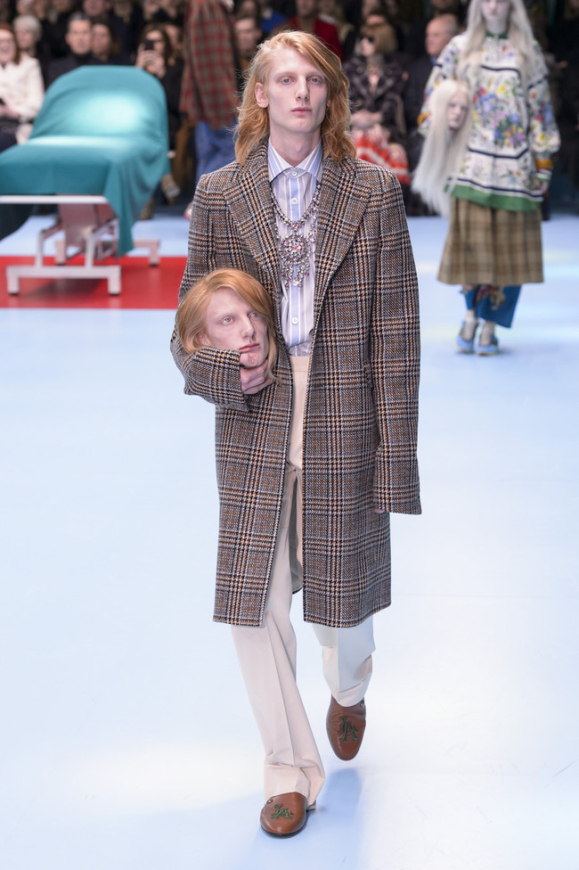 Cabezas Armani Gucci 2