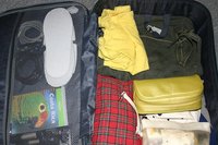 Preparativos de un viaje de negocios, objetivo rápido y compacto