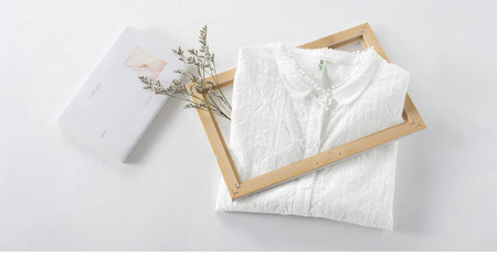 Camisa blanca con bordados por 12,27 euros y envío gratis en el aniversario de Aliexpress