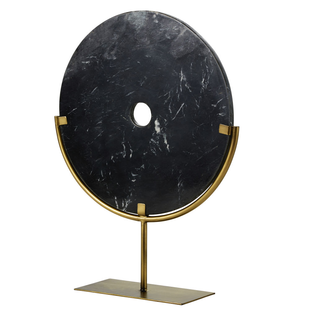Estatua de círculo de mármol negro y metal dorado