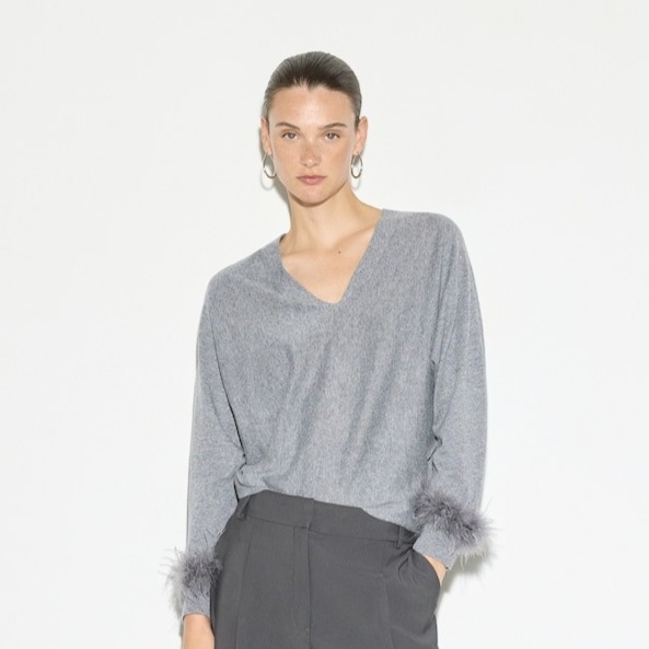 Woman El Corte Inglés - Jersey liso con cuello pico de mujer.