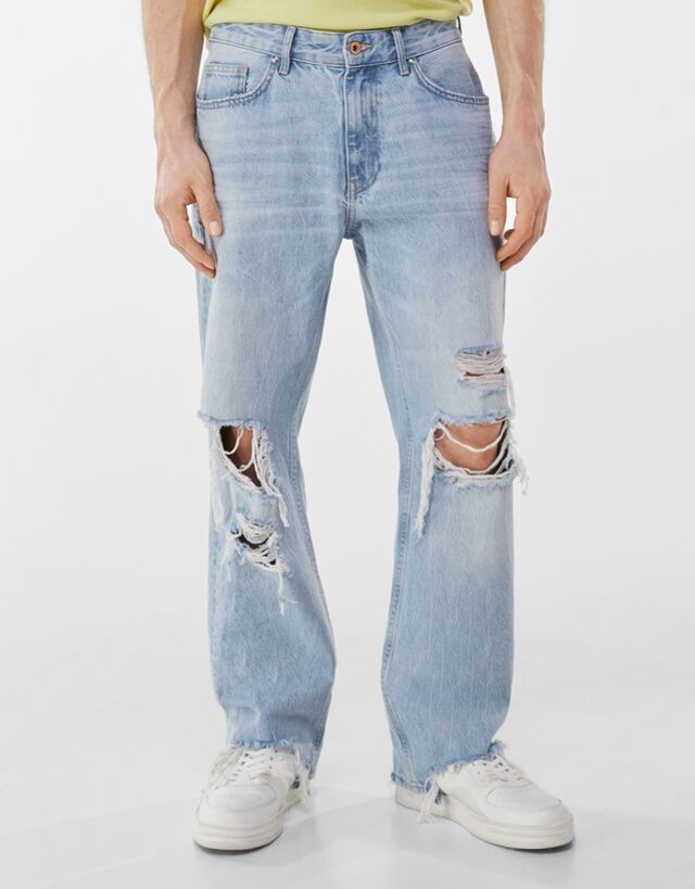 Jeans corte 90's con detalle de rotos y deslavado