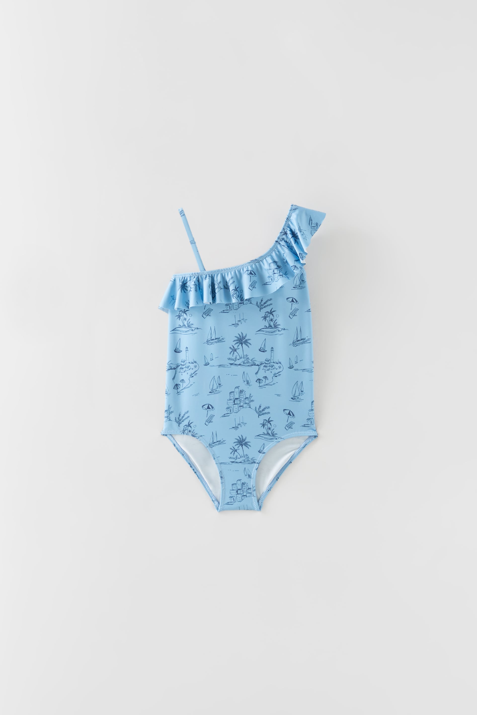 Bañador cuello asimétrico con tirantes y aplique volante.