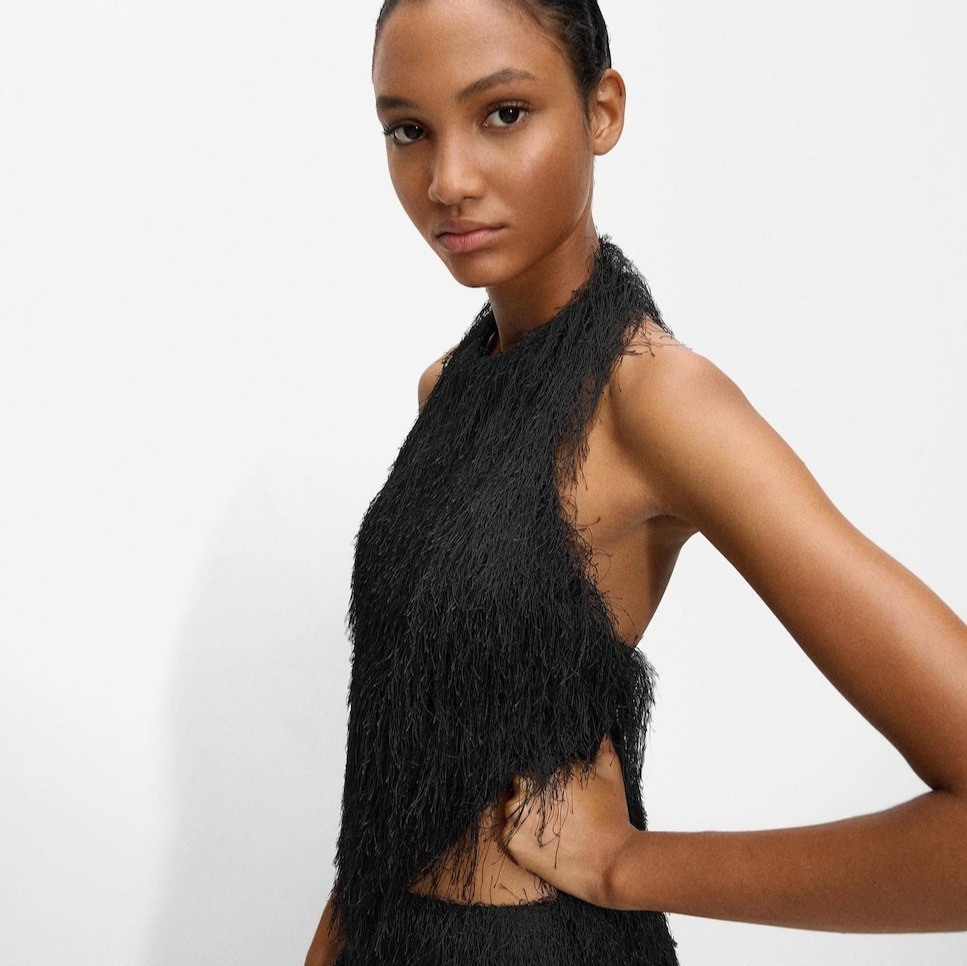 Parfois
Top de mujer con flecos efecto pelito y cuello halter