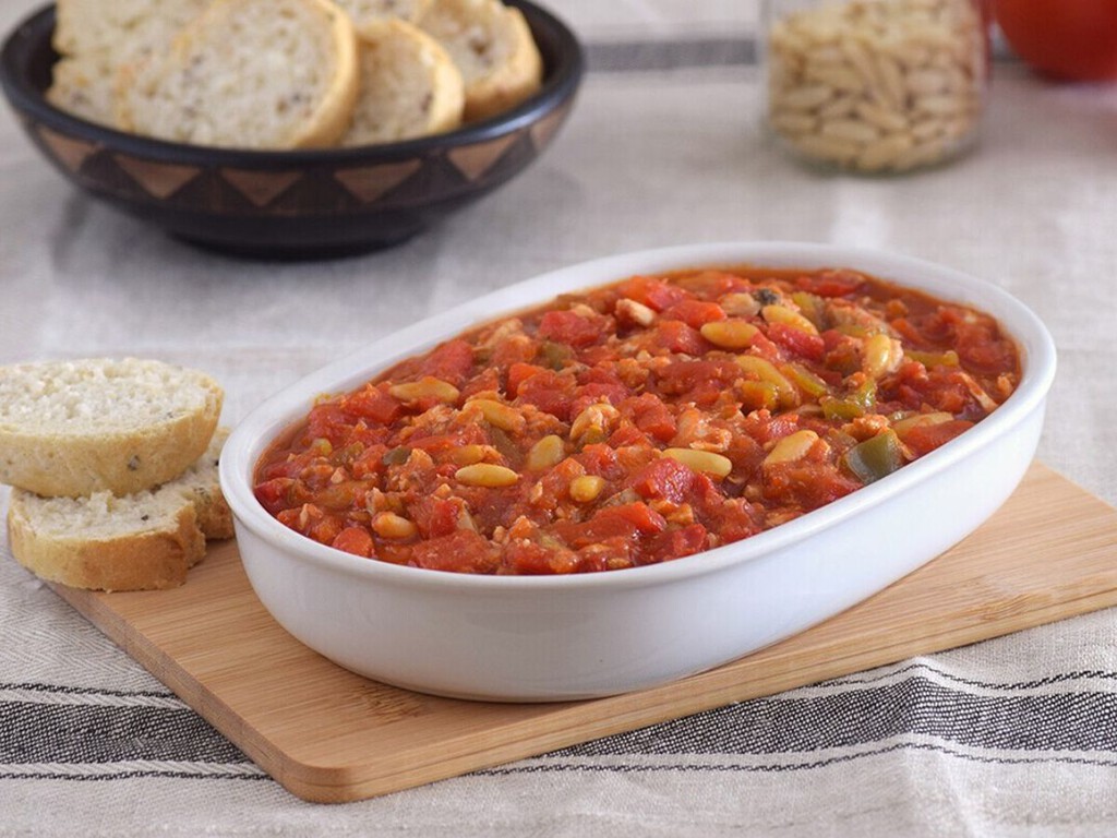 El plato típico de Valencia, que sabe a verano, y no se conoce en el resto de España. Mucho más fácil y fresquito que la paella 