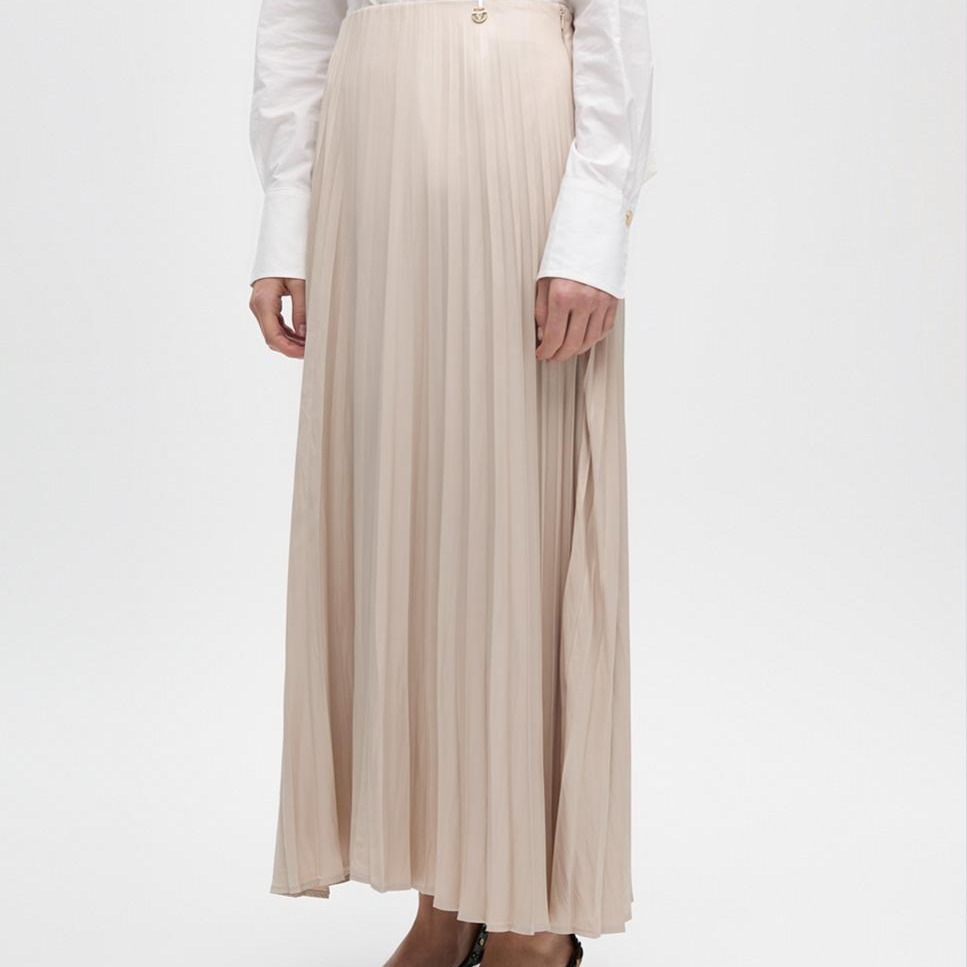Lola Casademunt
Falda plisada con acabado encerado