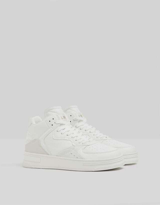 Zapatilla blanca de modelo de botín