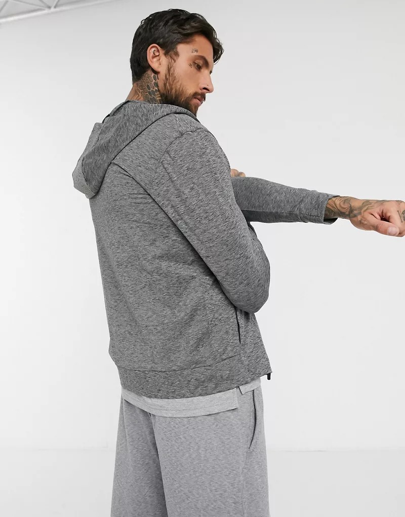 Sudadera con capucha y cremallera en gris oscuro Yoga de Nike