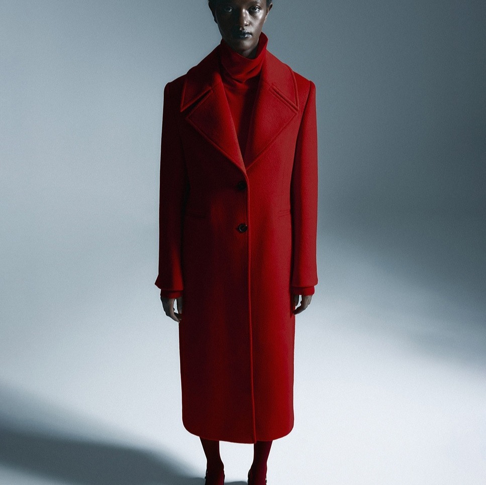 Sfera
Abrigo paño color