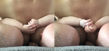 El tierno vídeo de unas gemelas tomadas de la mano mientras son amamantadas en tándem