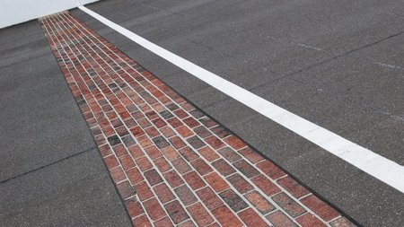 La yarda de ladrillo