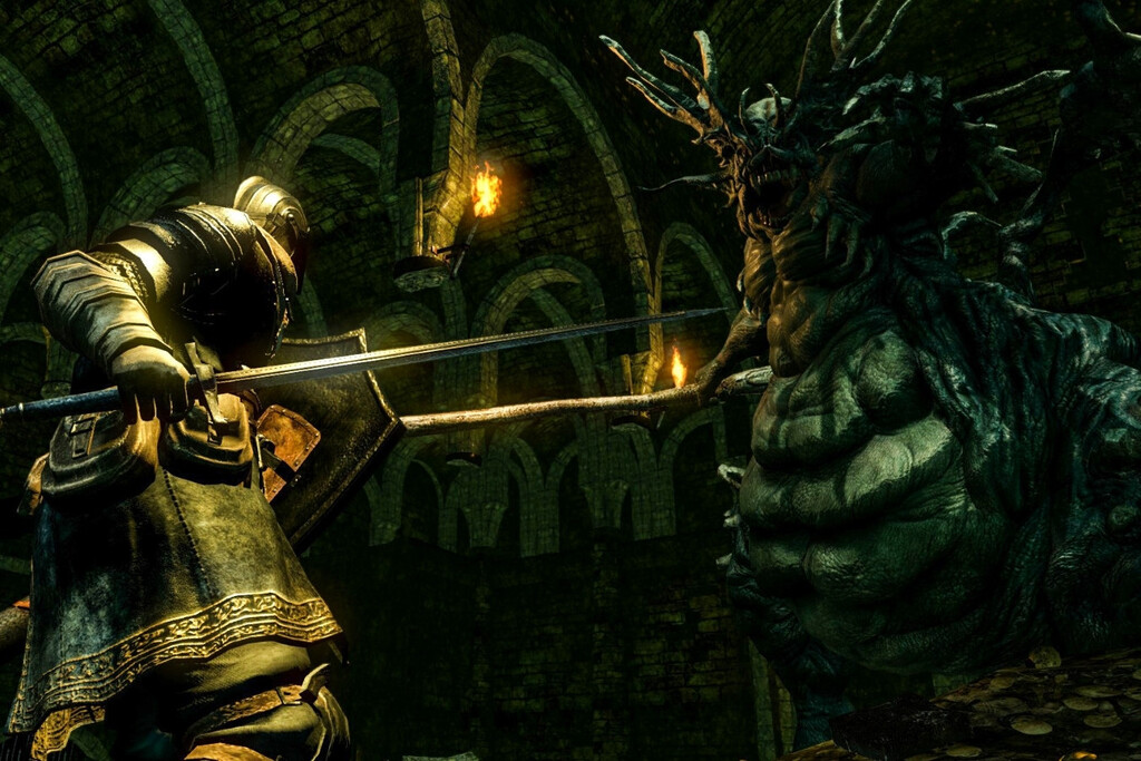 Personaje frente a un jefe en Dark Souls