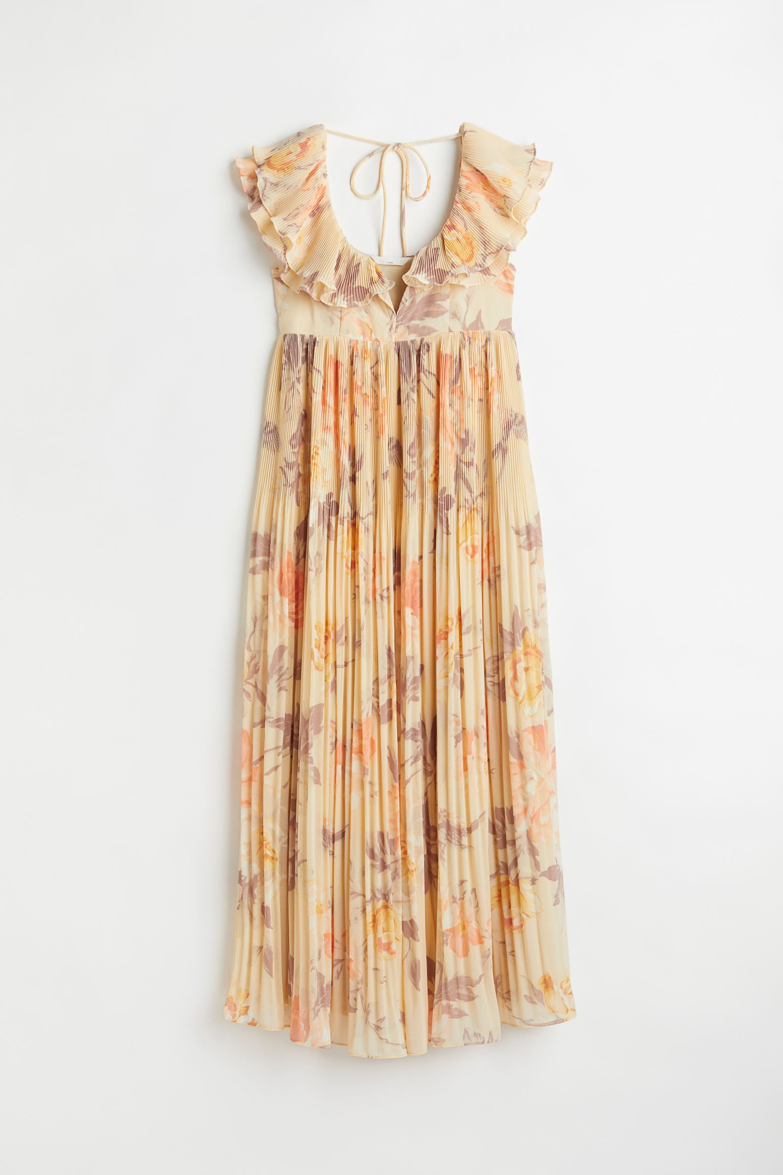 Vestido midi en gasa plisada con escote corazón y volante doble delante que continúa por hombros y espalda.