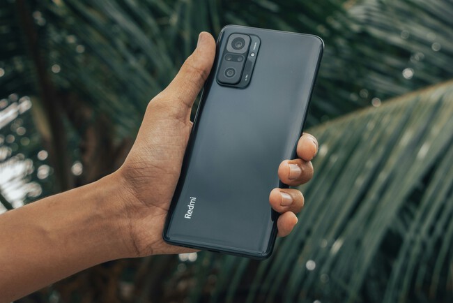 Persona Sosteniendo Movil Con Una Mano