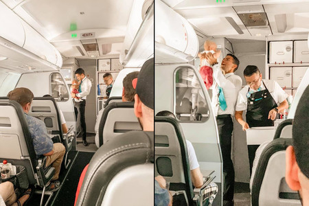 El precioso gesto de un auxiliar de vuelo, que ayuda a calmar a una bebé que lloraba