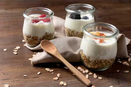 Natural Yougurt With Granola Cereals And Fruits