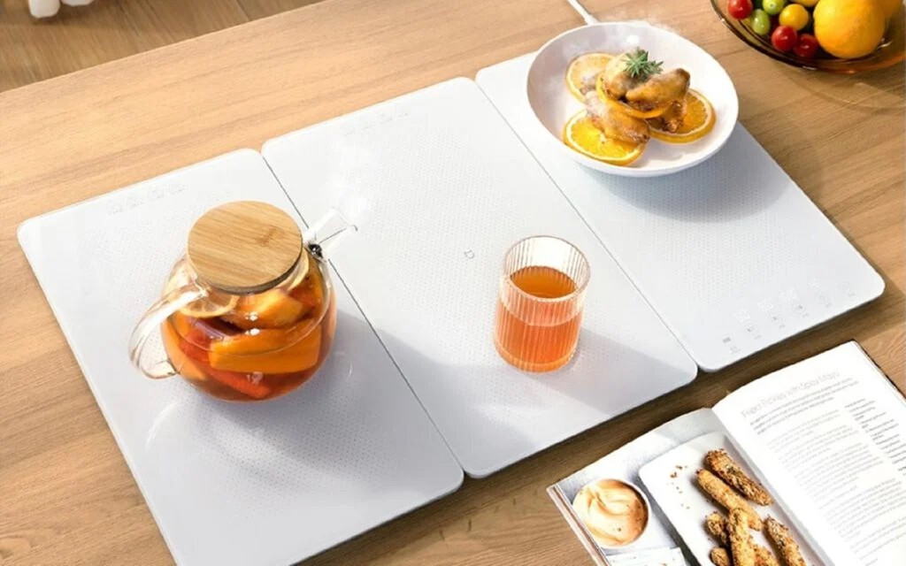 Xiaomi lanza una bandeja plegable para mantener calientes tus platos. Alcanza hasta 130 ºC y tu bebida seguirá estando fría 