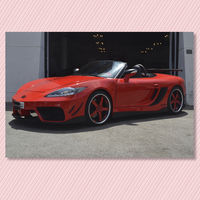 Este Porsche Boxster parece salido de 'GTA' y se vende en España: Supra por delante, Mégane por detrás y casi 60.000 euros