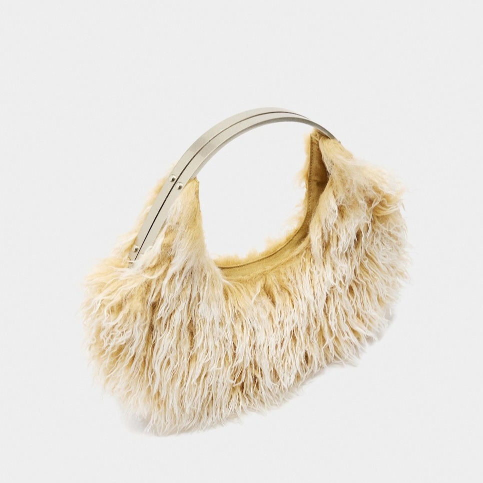 Parfois
Bolso de fiesta The Book Club de pelito con asa rígida