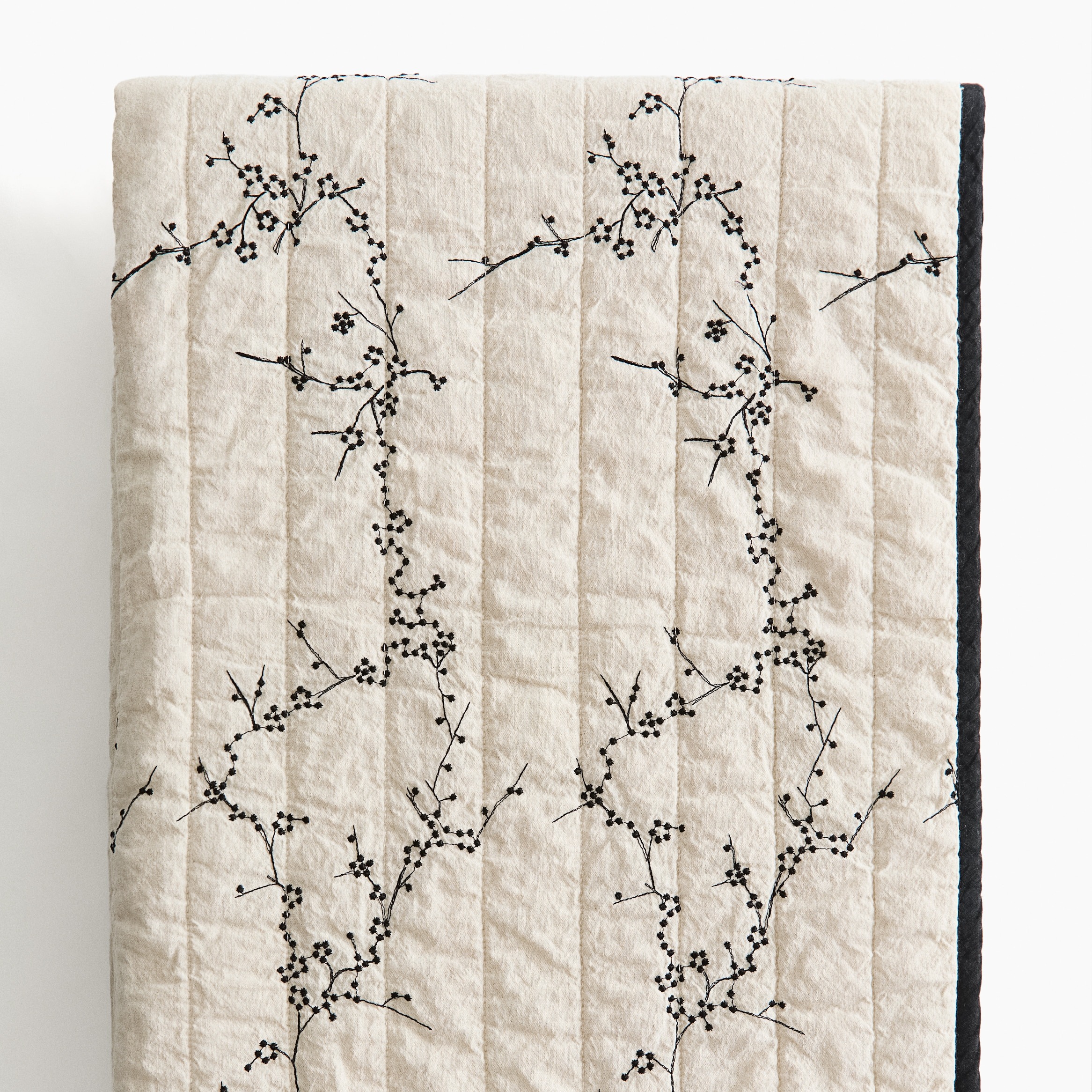 Cubrecama en mezcla de lino con detalle bordado