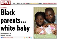 Una pareja de padres negros tienen un bebé blanco