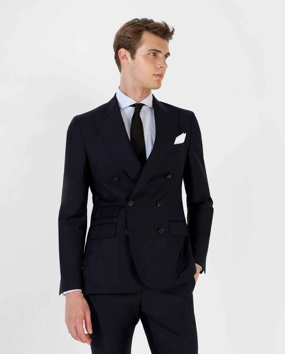 Traje regular liso color azul marino de SCALPERS