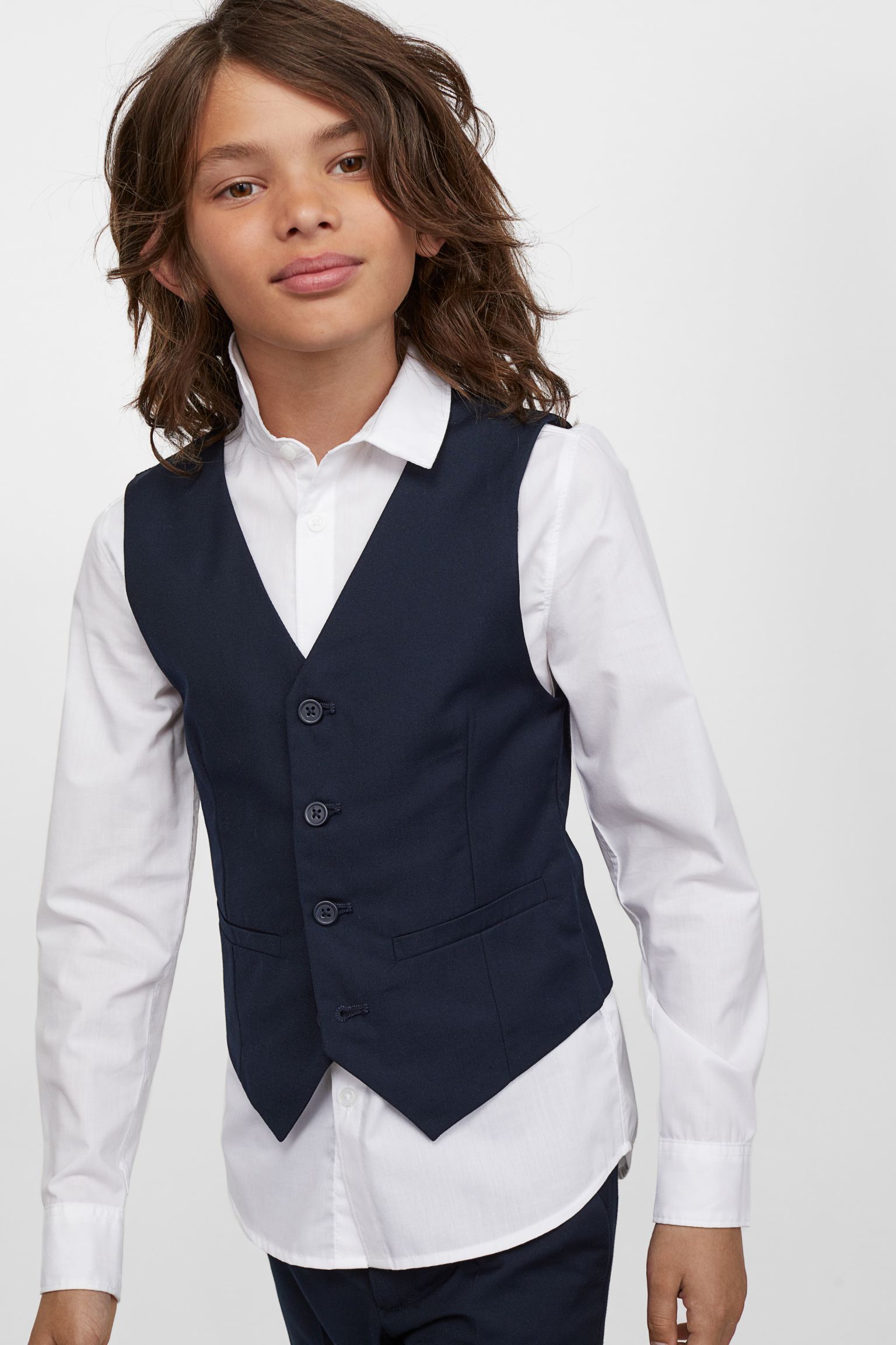 Conjunto de vestir de tres piezas.