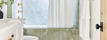 Trend alert;  the latest in bathroom coverings are colored marbles and onyx 