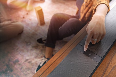 Klipsch Flexus Womans Finger Pushing Button On Core 300 Bk Overlay 2000x1333