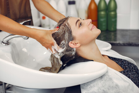 Woman Washing Head In Hairsalon