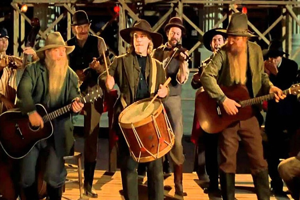 Una de las bandas de rock más legendarias se camufló de lleno en Regreso al Futuro 3, demostrando que hasta en el cine western podían pasar desapercibidos 