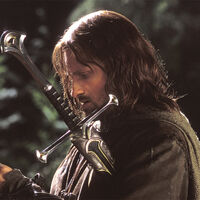 Pausa El Señor de los Anillos: El Retorno del Rey en el minuto 44 con 7 segundos, verás a un bisnieto de Tolkien luchando contra los orcos