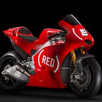 Las Aprilia RS GP se pintaron de (RED) en el GP de Valencia por la lucha contra el SIDA