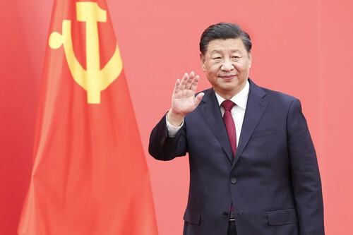 Xi