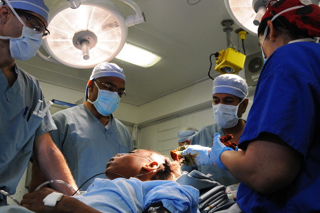 Us Navy 100118 N 8878b 078 Surgeons Perform Surgery On A 12 Year Old Haitian Girl With A Severe Head Injury Aboard The Nimitz Class Aircraft Carrier Uss Carl Vinson Cvn 70