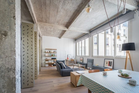 Antes y después: un espacio industrial de los años 20 convertido en un moderno apartamento en París