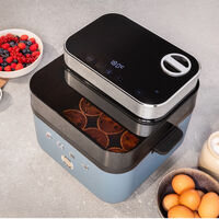 La nueva freidora de aire de SMEG promete platos "dorados y crujientes por fuera, tiernos y jugosos por dentro." Así quieren conseguirlo