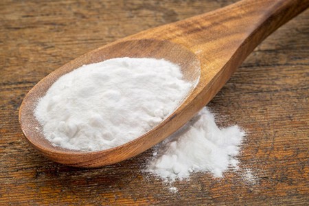 Baking Soda On A Spoon Which May Be Used For Acne