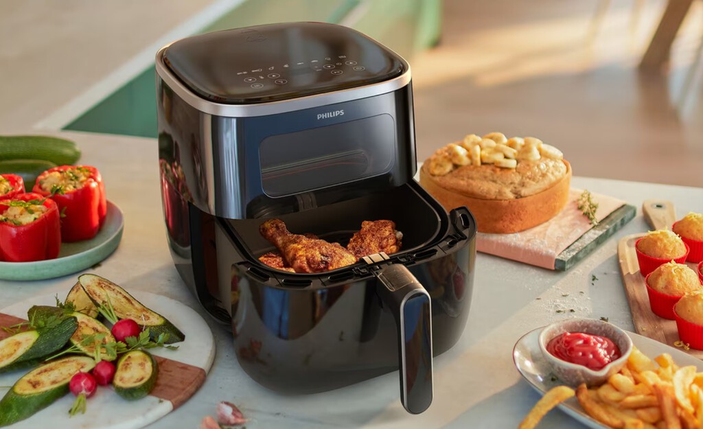 Lo nuevo de Philips es esta freidora de aire con ventana iluminada: tiene 13 funciones de cocinado y aplicación de recetas para el móvil
