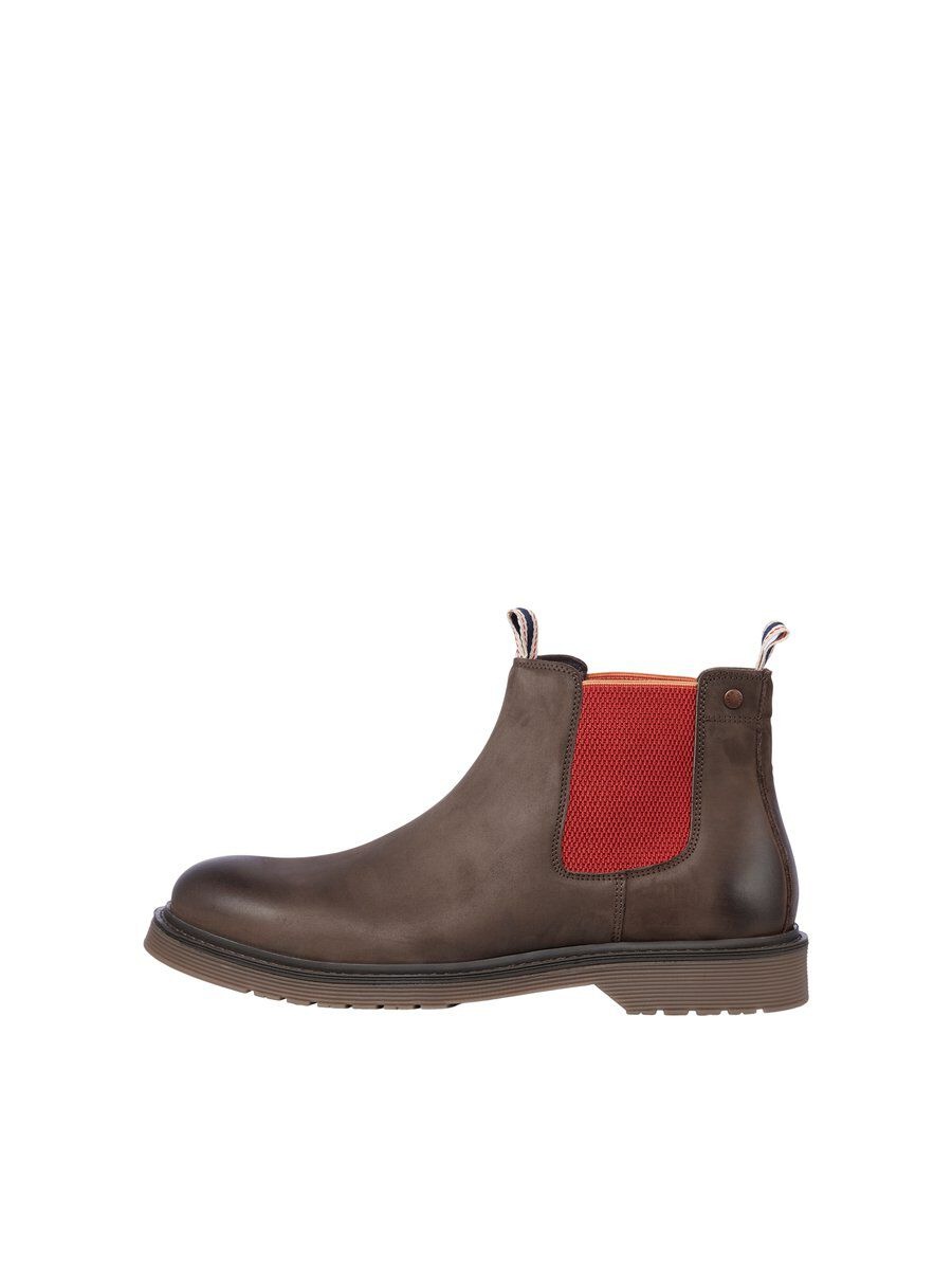 Botas Chelsea
- Trabilla posterior y paneles elásticos laterales
- Forro de piel y suela de goma ultraduradera
- Diseño versátil apto para todas las temporadas