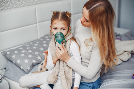 Mother With Her Illnes Daughter Bedroom