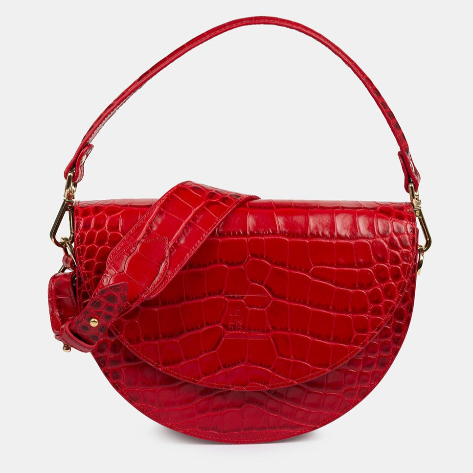 Leandra
Bandolera de mujer multiposición de piel grabada en coco tipo saddle en color rojo