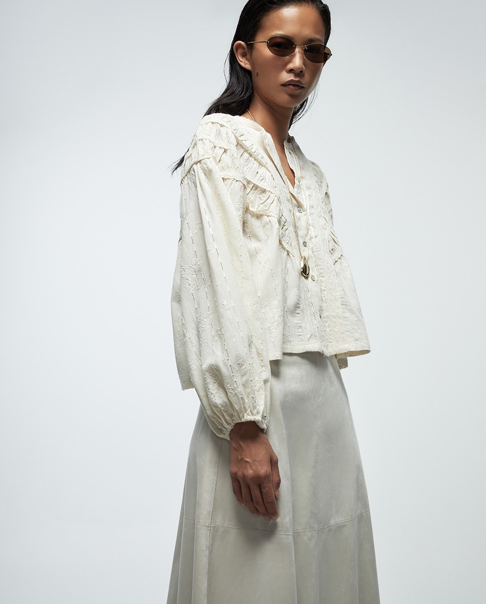 Blusa con volantes Sfera