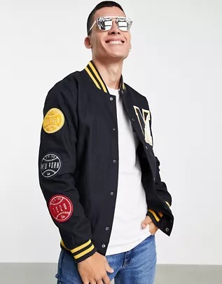 Chaqueta universitaria en azul marino Heritage de New Era