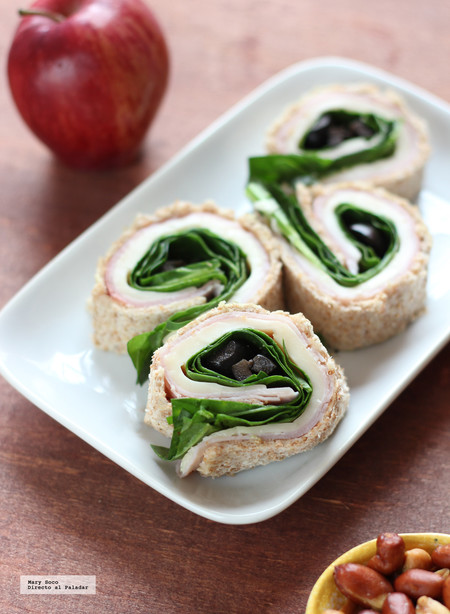 Rollitos de sándwich de jamón, espinacas y queso. Receta para el lunch escolar
