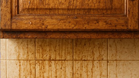 Cómo limpiar la grasa pegada de los muebles de madera de la cocina con una mezcla que es una maravilla