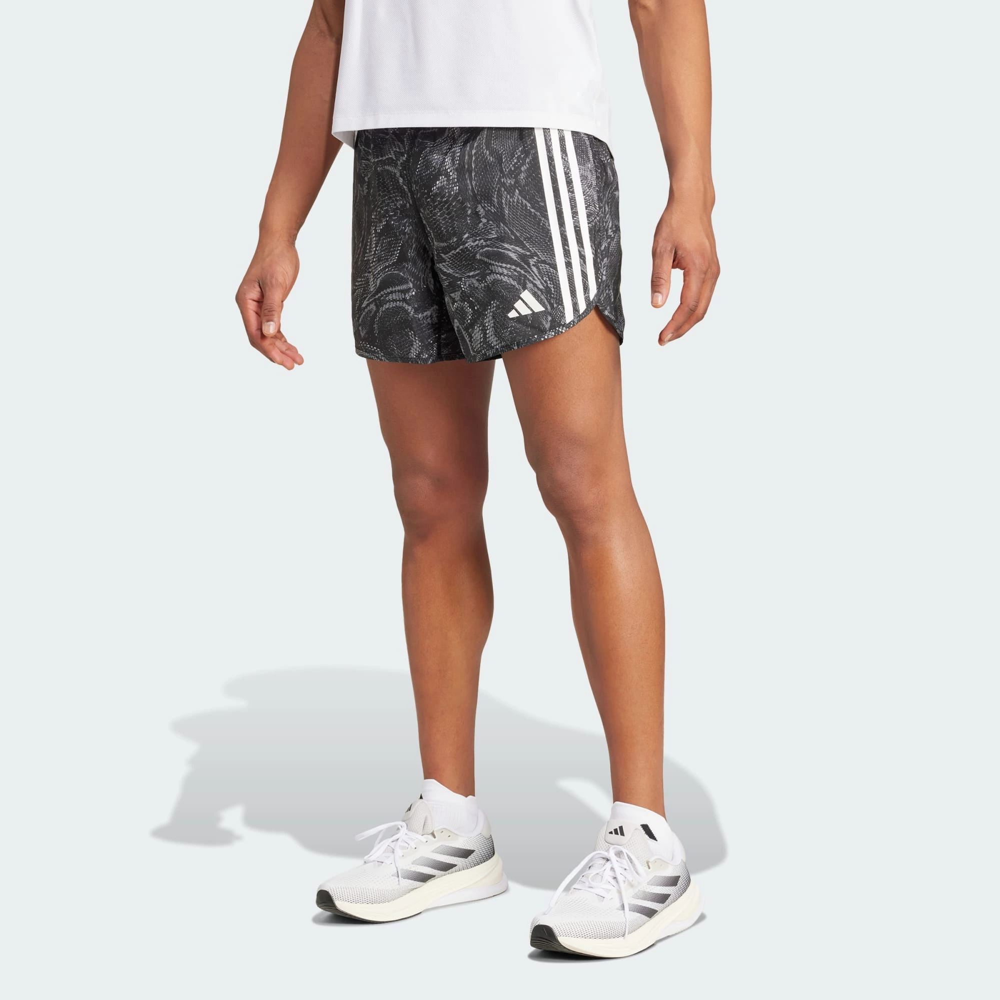Pantalón corto Own the Run Excite Allover Print AEROREADY

