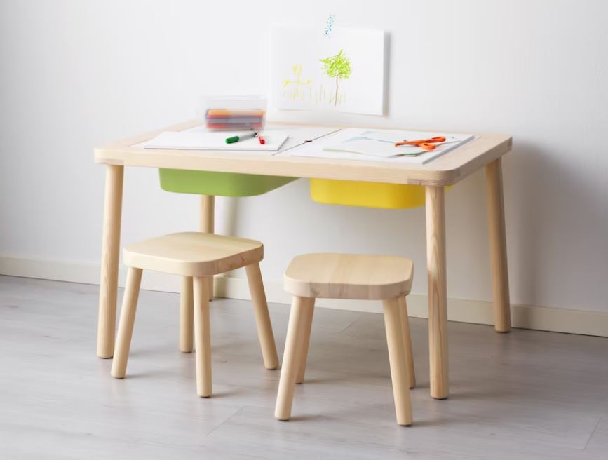 Mesa para niños FLISAT con compartimentos internos para guardar accesorios